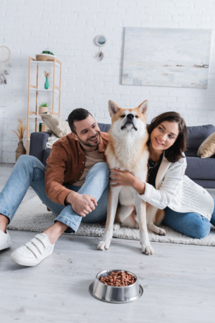 Happy couple and their dog