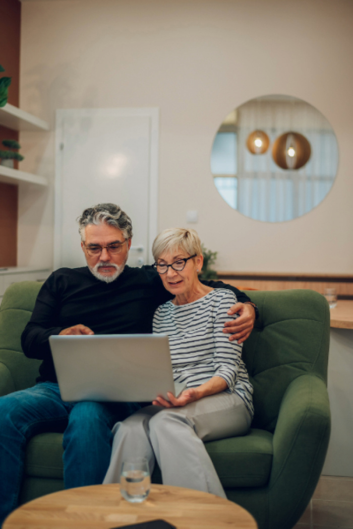 Older couple reviewing their retirement funds