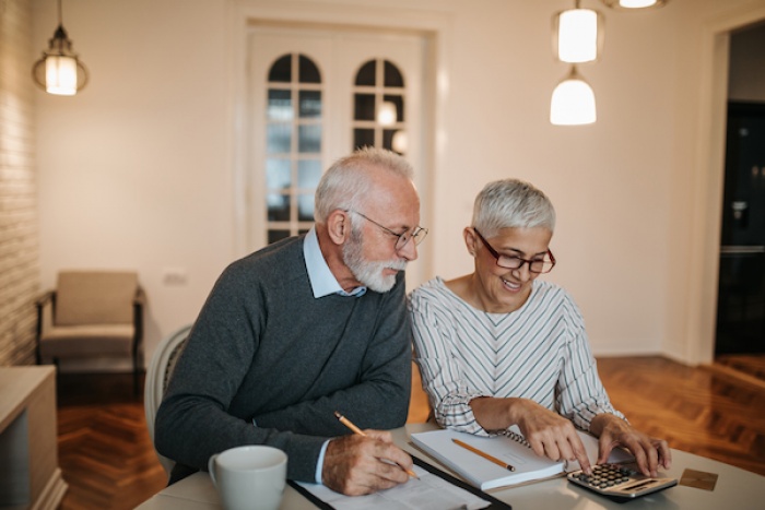 older couple reviewing their finances