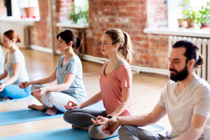 People meditating on future saving