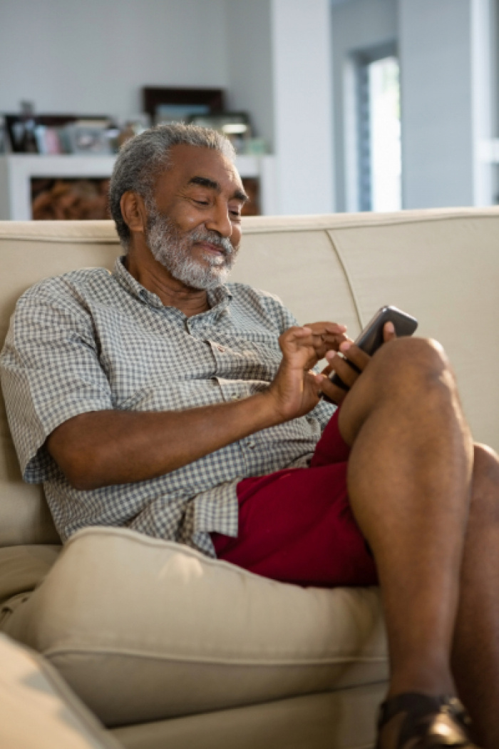 Older man browsing retirement options.
